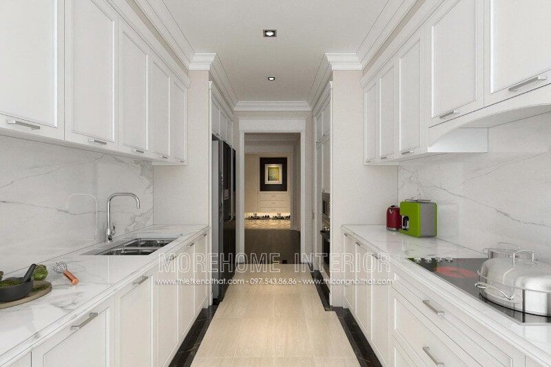 Chọn tone màu trắng làm gam màu chủ đạo sẽ làm cho căn bếp trở nên sang trọng hơn và thoáng đãng hơn khi kết hợp với tủ bếp gỗ hiện đại.